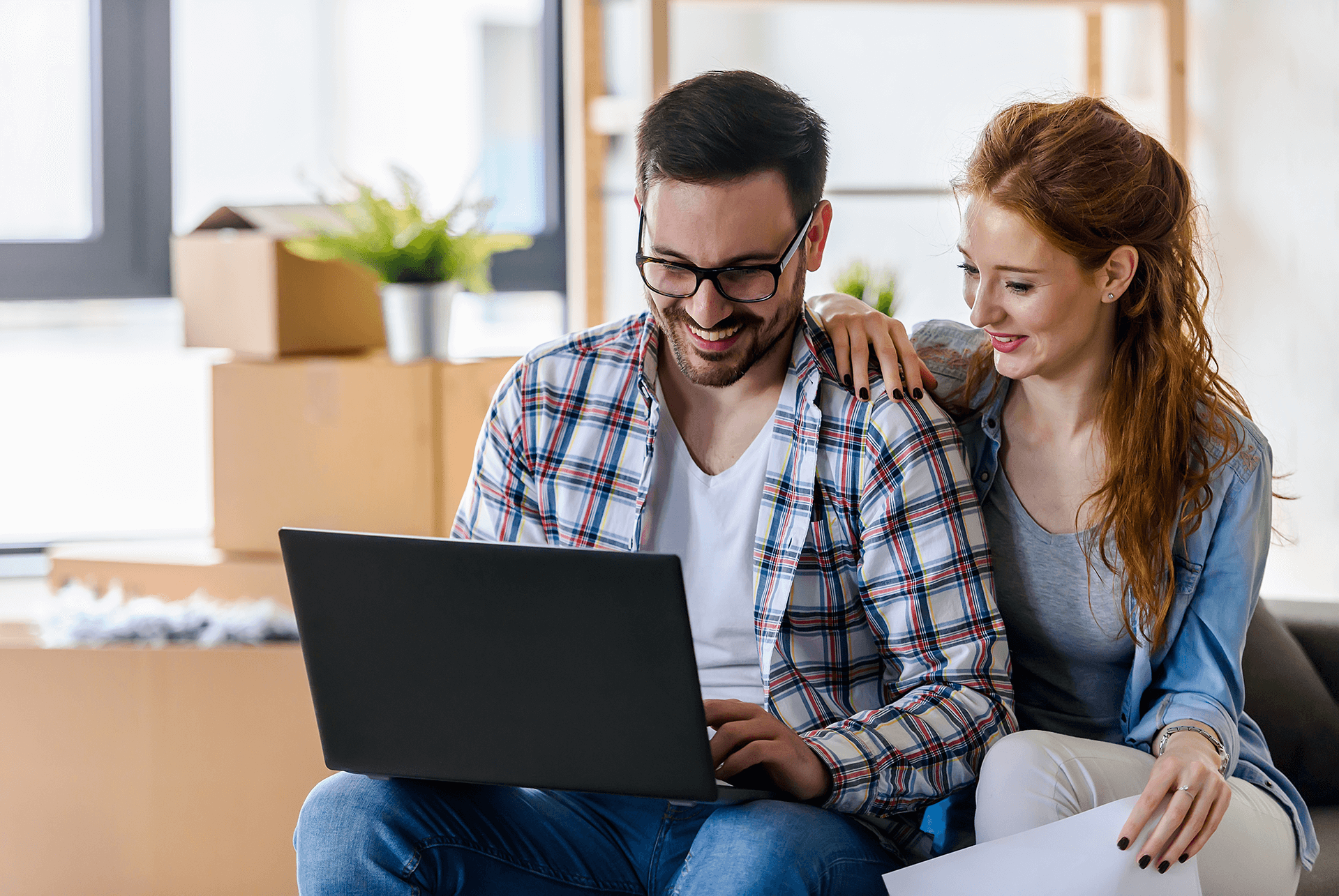 young couple with laptop.png
